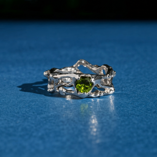 Anillo natal de Leo- Peridoto